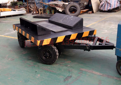 1677135300425175.jpg 10噸車間工件鐵皮卷圓桶運輸平板拖車3I.jpg