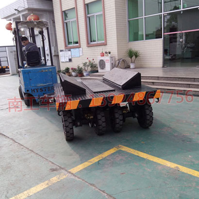 1677135432162616.jpg 10噸車間工件鐵皮卷圓桶運輸平板拖車4I.jpg